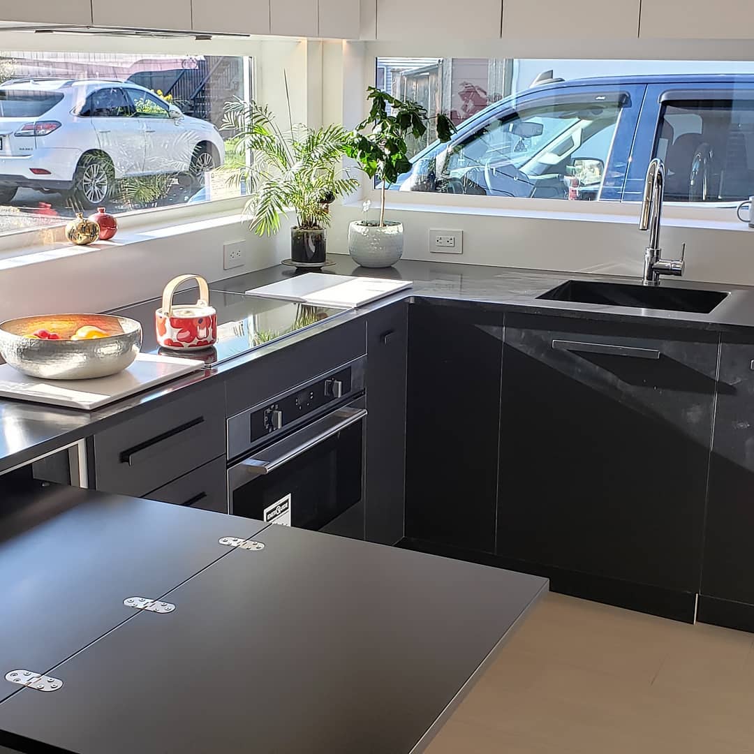 Solid surface countertop fitted inside a boat galley