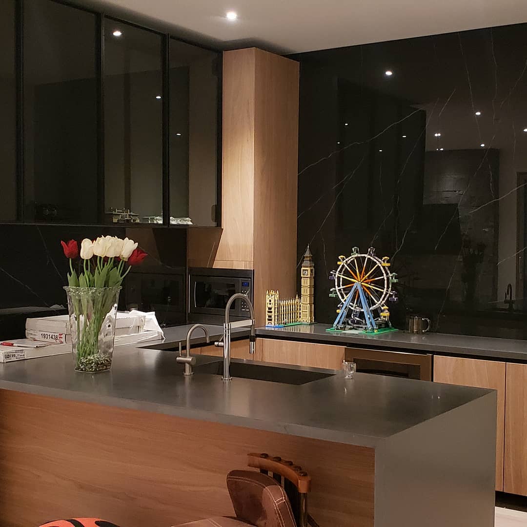 Residential kitchen with seamless solid surface countertop and integrated sink